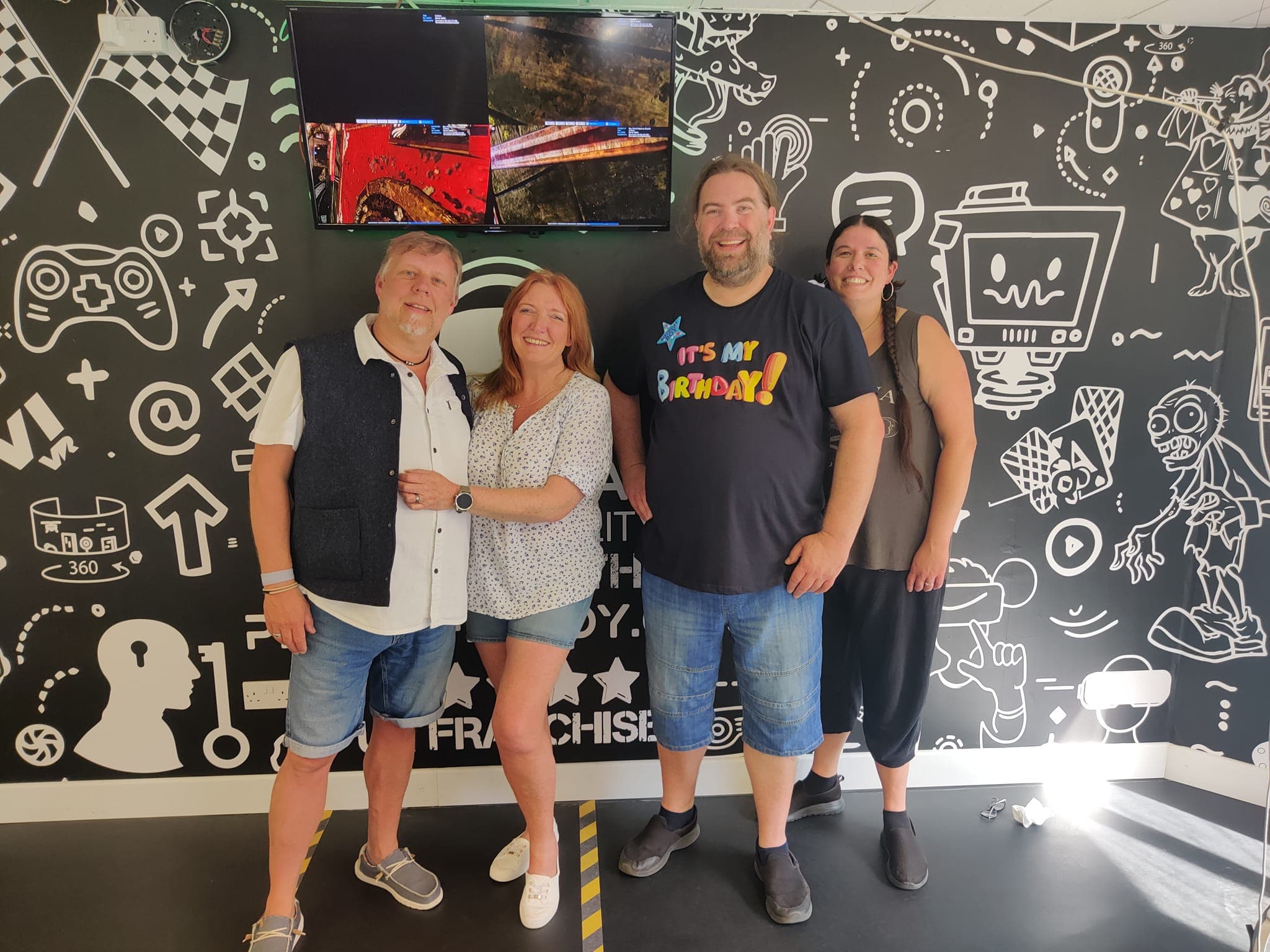 Adults celebrating a birthday at Player Ready with VR experiences and gaming