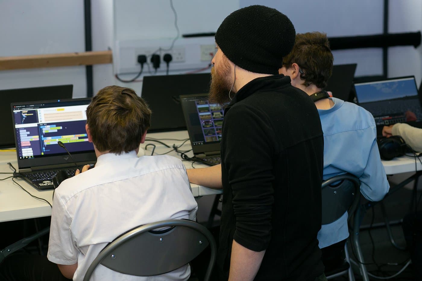 Children collaborating on a game design project at Player Ready