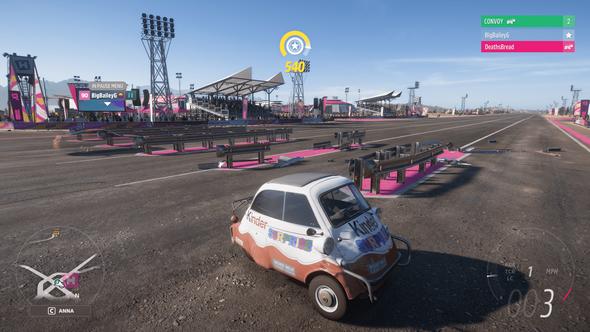 Custom Kinder Surprise branded microcar being tested on a drag strip in BeamNG